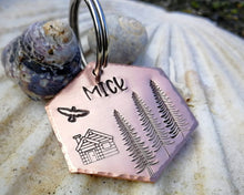 Load image into Gallery viewer, Hexagon dog name tag, handstamped with cabin & trees