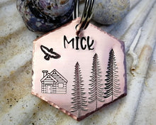 Load image into Gallery viewer, Hexagon dog name tag, handstamped with cabin & trees