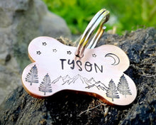 Load image into Gallery viewer, Bone dog tag, hand stamped with mountains & trees