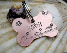 Load image into Gallery viewer, Bone dog tag, hand stamped with cute dino