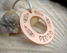 Load image into Gallery viewer, Washer dog tag, hand stamped with feathers