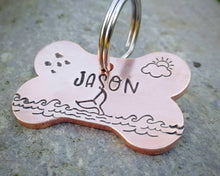 Load image into Gallery viewer, Bone dog tag, hand stamped with ocean design