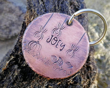 Load image into Gallery viewer, Halloween dog tag, hand stamped with spooky design & pumpkin