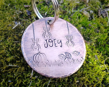 Load image into Gallery viewer, Halloween dog tag, hand stamped with spooky design & pumpkin