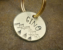 Load image into Gallery viewer, Cat id tag, hand stamped with mountains & trees
