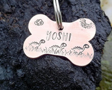 Load image into Gallery viewer, Bone dog tag, hand stamped with cute dino