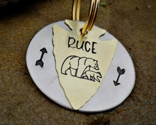 Load image into Gallery viewer, Arrowhead dog tag handstamped with bear