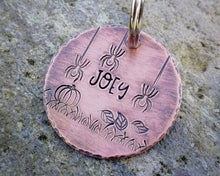Load image into Gallery viewer, Halloween dog tag, hand stamped with spooky design & pumpkin