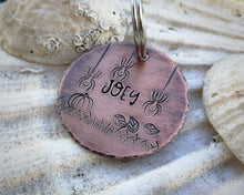 Load image into Gallery viewer, Halloween dog tag, hand stamped with spooky design & pumpkin