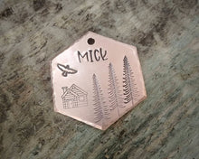 Load image into Gallery viewer, Hexagon dog name tag, handstamped with cabin & trees