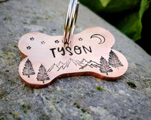 Load image into Gallery viewer, Bone dog tag, hand stamped with mountains & trees