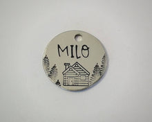 Load image into Gallery viewer, Cat name tag, hand stamped with trees & cabin