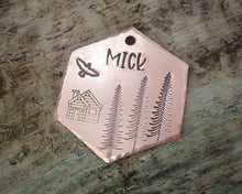Load image into Gallery viewer, Hexagon dog name tag, handstamped with cabin & trees
