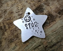 Load image into Gallery viewer, Small pet id tag, Aluminium star hand stamped with moon & stars, lightweight cat tag