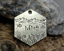 Load image into Gallery viewer, Hexagon dog tag, hand stamped with nautical design, octopus & fish