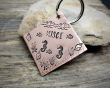 Load image into Gallery viewer, Square dog id tag, hand stamped with ocean design, seahorse & fish