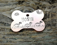 Load image into Gallery viewer, Bone dog tag, hand stamped with cute dino