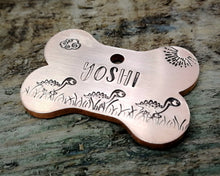 Load image into Gallery viewer, Bone dog tag, hand stamped with cute dino