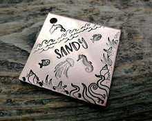 Load image into Gallery viewer, Square dog tag, handstamped with ocean design, seahorse & fish
