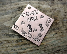 Load image into Gallery viewer, Square dog id tag, hand stamped with ocean design, seahorse & fish