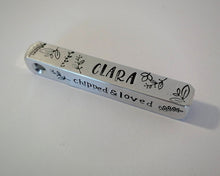 Load image into Gallery viewer, Bar tag, dog id tag, hand stamped with leaf design and 'chipped & loved'