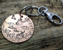 Load image into Gallery viewer, Dog tag with a matching keychain, hand stamped with ocean design