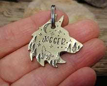 Load image into Gallery viewer, Wolf head dog tag, handstamped with howling wolf, trees and moon