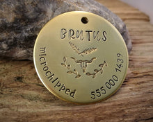 Load image into Gallery viewer, Large pet tag, hand stamped with phone number, 'microchipped' & longhorn design