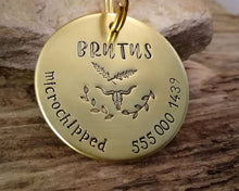 Load image into Gallery viewer, Large pet tag, hand stamped with phone number, 'microchipped' & longhorn design