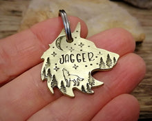 Load image into Gallery viewer, Wolf head dog tag, handstamped with howling wolf, trees and moon