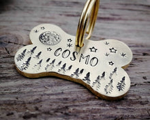 Load image into Gallery viewer, Bone dog tag, hand stamped with moon, stars & trees