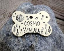 Load image into Gallery viewer, Bone dog tag, hand stamped with moon, stars & trees