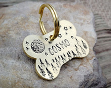 Load image into Gallery viewer, Bone dog tag, hand stamped with moon, stars & trees