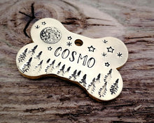 Load image into Gallery viewer, Bone dog tag, hand stamped with moon, stars & trees