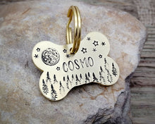 Load image into Gallery viewer, Bone dog tag, hand stamped with moon, stars & trees