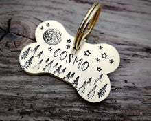 Load image into Gallery viewer, Bone dog tag, hand stamped with moon, stars & trees