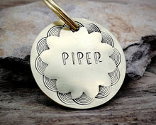 Load image into Gallery viewer, Medium dog id tag, hand stamped with border