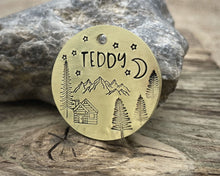 Load image into Gallery viewer, Dog id tag, hand stamped with mountains, trees & cabin