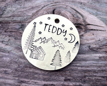 Load image into Gallery viewer, Dog id tag, hand stamped with mountains, trees & cabin