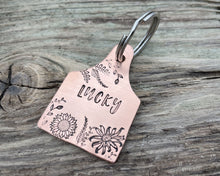 Load image into Gallery viewer, Cow ear tag dog tag, hand stamped pet id tag with flower design
