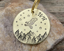 Load image into Gallery viewer, Large dog id, hand stamped with adventure design, mountains & eagle