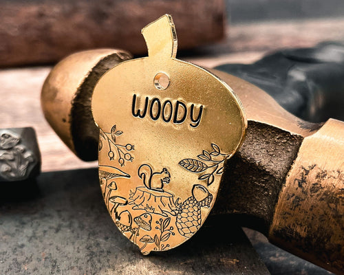acorn dog tag with forest and squirrel design