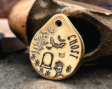 Load image into Gallery viewer, brass dog tag for small dogs with Halloween design

