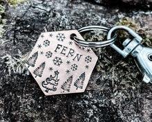 Load image into Gallery viewer, Hexagon dog tag, hand stamped with Christmas design &amp; snowflakes
