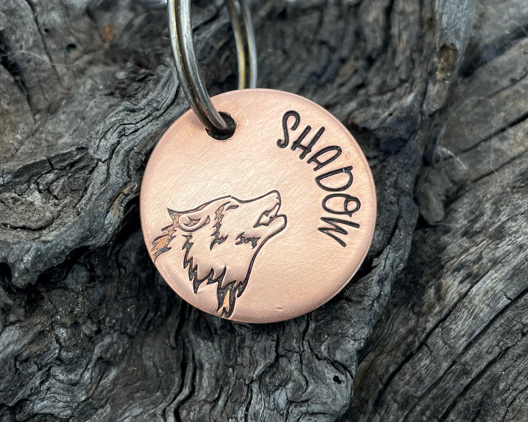 Small dog id tag, hand stamped with wolf head
