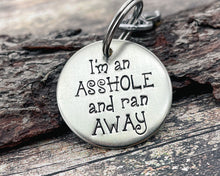 Load image into Gallery viewer, Funny dog tag, hand stamped with &#39;I&#39;m an asshole and ran away&#39;
