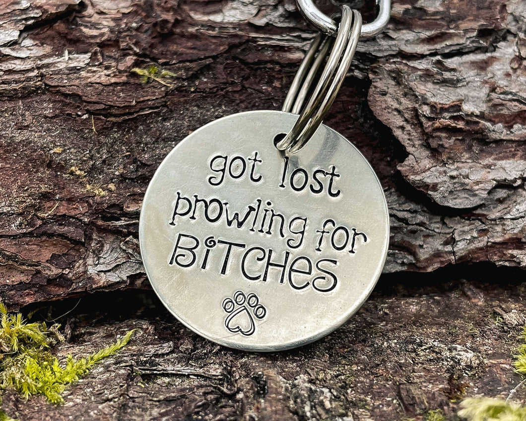 Funny dog id tag, hand stamped with 'got lost prowling for bitches'
