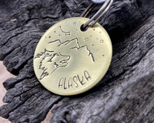 Load image into Gallery viewer, Dog id tag, hand stamped with wolf head, mountains &amp; star design
