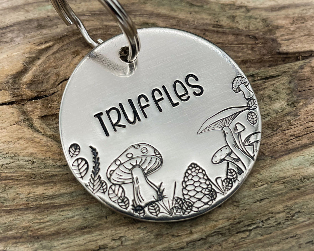 Fall dog tag, hand stamped with mushrooms, leaves and pine cone