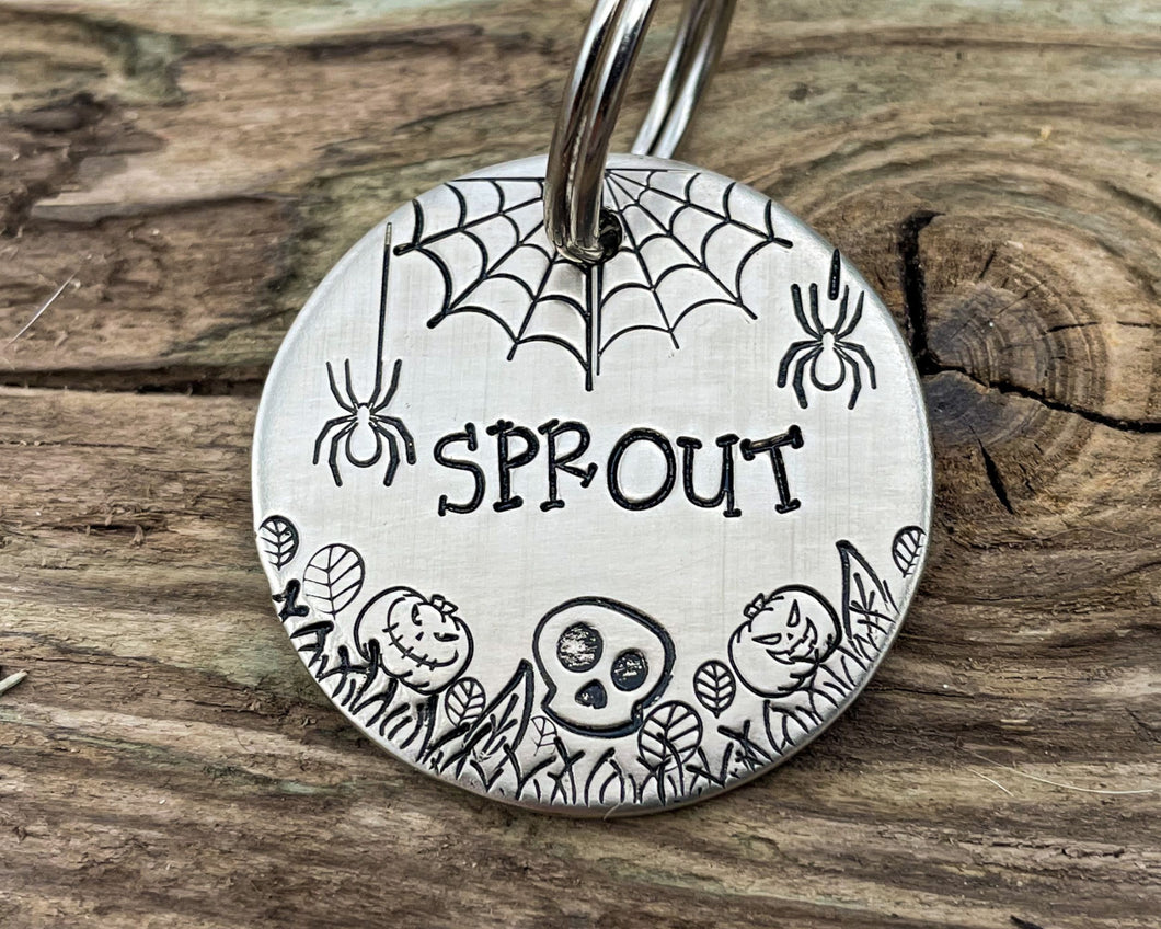 Spooky dog tag with cobwebs, spiders and pumpkins